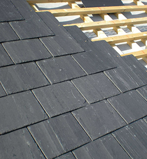 Part way through a slate roof in Coventry
